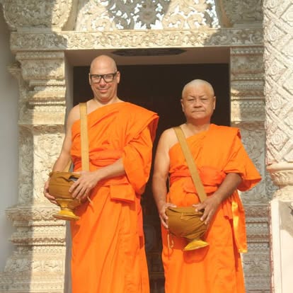 Todd Daniels with a Buddhist monk in Thailand